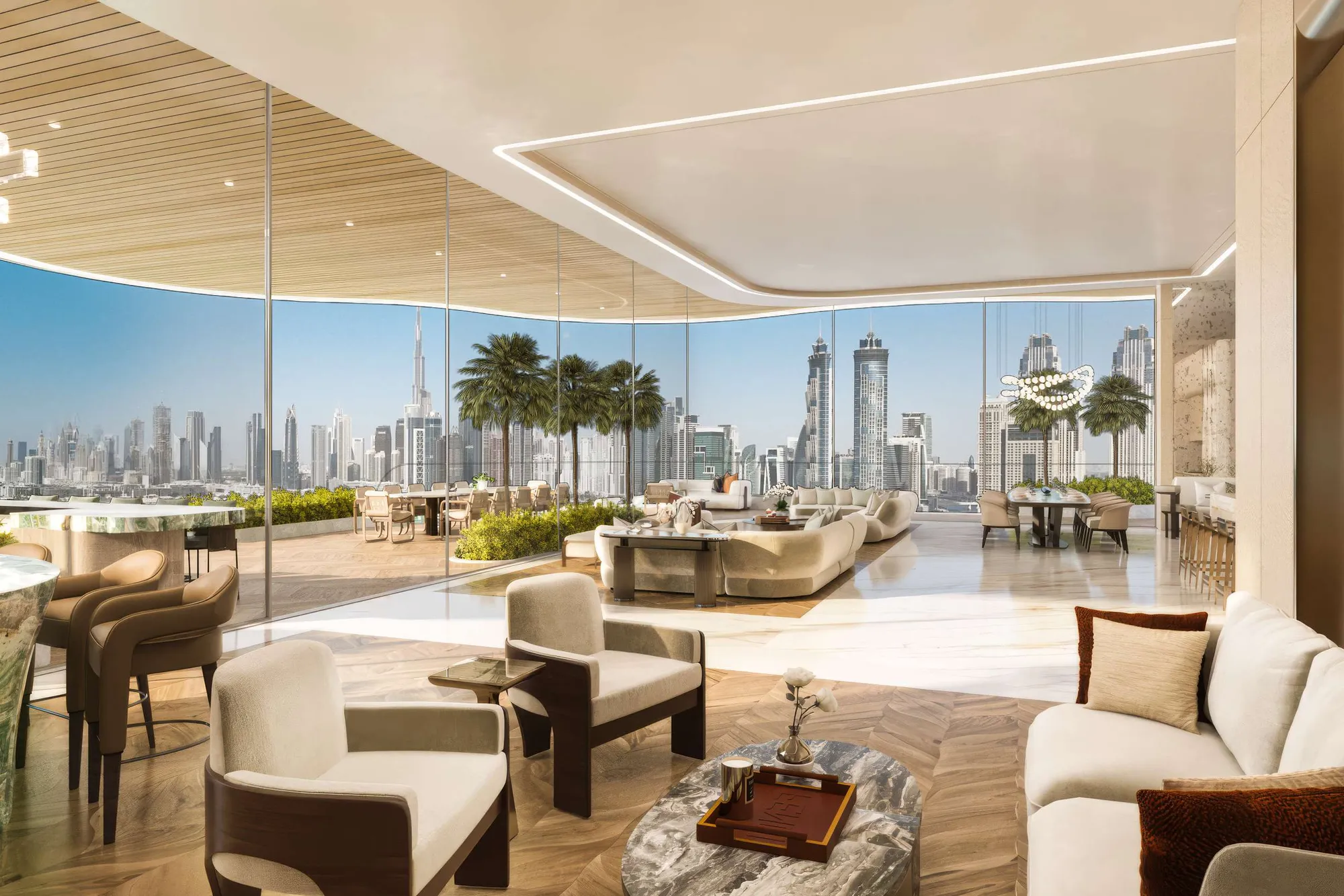 Lounge with curved glass walls looking out to the Downtown skyline
